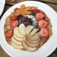 Vegan sweet omelet (maca and chickpea flour) with homemade chocolate cream and jam at Hummus Amamamusi in Krakow