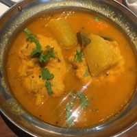 Chickpea flour doughnuts in a rich sauce  at Veg Kitchen in Tokyo