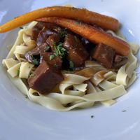 Seitangulasch mit Tagliatelle  at Chez Mara in Rostock