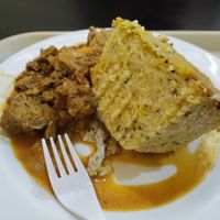 Rice and soy milk slice with seitan stew at Raices in Santo Domingo