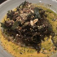 Cabbage red curry with mushrooms and crispy curry leaves   at Driftwood in Boynton Beach