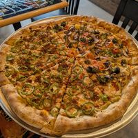 Half Natalie Portman (left) half vegan veggie (right) at Wowee Zowee Pizza in Tustin