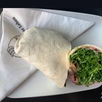 Wrap with rocket salad, red beet hummus, and sweet mustard - delicious, give it a try! (This is the small version, the larger one is 4 pieces).  at Blueorange Coffee and Bagel - Margaretenstrasse in Vienna