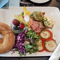 Bagel with 3 spreads, vegetables and a fruit pot at Blueorange Coffee and Bagel - Margaretenstrasse in Vienna