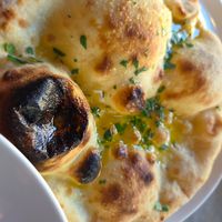 Vegan garlic pizza bread with parsley at Bosco Pizzeria in England