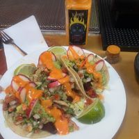 Vegan tacos and hot sauce. So good!!! Big flavor!   at El Chingon in San Diego
