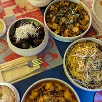 Eggplant, Mapo tofu, peanut nooles, and cauliflower at GĀO in Buenos Aires