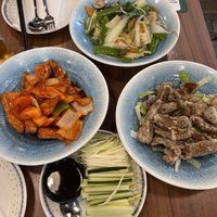 Sweet and sour bean curd, vegetables with garlic, mock duck to eat with cucumber, leek and wrap (not on the picture).   at Dragon Oriental Restaurant in Manchester