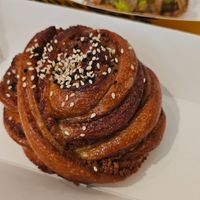 Vegan Tahini Bun
A vegan tahini bun – fluffy dough rolled with a sweet tahini (sesame) filling. at Nomad Bread & Coffee in Lefkosia