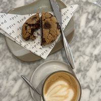 Vegan cookie sandwich & oat decaff flat white   at Park Side in Cardiff