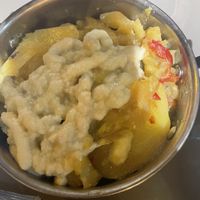 Cheesy potatoes  at Vegan Rock in Sevilla