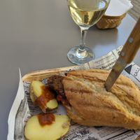 Brioche bun with chorizo, bacon and red peppers at Vegan Rock in Sevilla