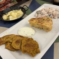 Tapas: non chicken skewer, potato tortilla, ensaladilla, and vegarones in vinegar  at Vegan Rock in Sevilla