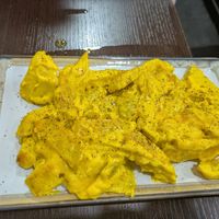 Scrambled potatoes with vegan egg at Vegan Rock in Sevilla