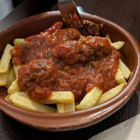 Albóndigas con tomate, sobre cama de patatas at Vegan Rock in Sevilla