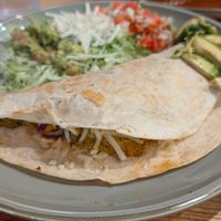 Vegan quesadilla with vegan cheese and zucchini flowers. at Mextizo in Cedar Rapids