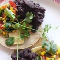 Huevos rancheros - vegan version with a cashew cheese, black beans and salsa. Very tasty.  at True North in Coburg
