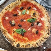 Marinara pizza with olives   at Fatto a Mano Hove in Hove