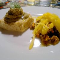 Tortino di miglio con crema di melanzane e lenticchie con avocado at Yoo Restaurant in Perugia