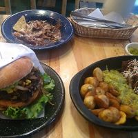 Hamburguesa, picada y nachotes ya casi terminados   at La Cocinita Verde in Bogota