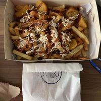 Salchipapas y empanada - Rappi  at La Cocinita Verde in Bogota