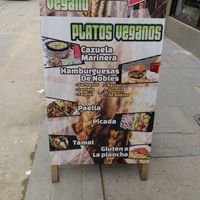 Sign on sidewalk at De Nobles in Bogota