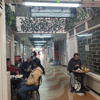 Seating also part of restaurant at De Nobles in Bogota