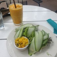 Passionfruit & turmeric juice, hummus & arugula sandwich at Juice Bar at the Harmony Hotel in Nosara