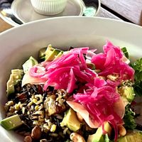 Grain bowl with sweet potato and avocado with sesame dressing at Harmony Hotel Restaurant in Nosara