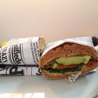 Vegan sandwich with hummus, spinach, preserved carrots, semidried tomatoes, zucchini and avocado at Mulles madglæde in Nyborg