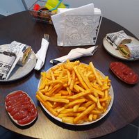 Big portion of french fries with ketchup, and vegan sandwiches at Mulles madglæde in Nyborg