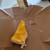 Half of a passionfruit cheesecake (couldn't take a picture fast enough 🤣) at Clarendon perk in Leicester