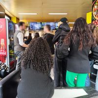 Queue inside at Janni Pizza in Zurich