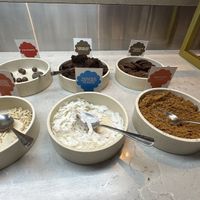 Coconut flakes, biscoff crumble, almonds for toppings  at Royal Stacks Crown Casino in Southbank