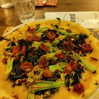 Pizza multicolor at Farro Pizzeria in Lazio