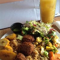 Fried lentils over rice, with plantains, mixed veggies, and a mixed, sprout, beet salad. The juice drink was carambola (starfruit). A great combination! at Ital in Paradise in St Croix