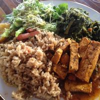 Our meal -- spicy tofu, kale, coconut fried rice, and salad at Ital in Paradise in St Croix