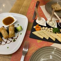 Cheese platter and spring rolls at Gintilla in Cagliari