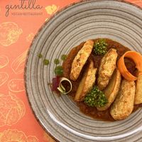 Chickpea and rice nuggets with ajika sauce. 😋   at Gintilla in Cagliari