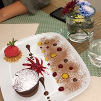 Chocolate lava cake and raspberry sorbet at Gintilla in Cagliari