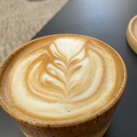 Flat with with pea vegetable drink at Tiger & Chick - Coffee and Delights in Lisboa