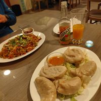 Vegetable momos (filled with cabbage) with a spicy indian sauce at Rikša - Curry & Wok in Ljubljana