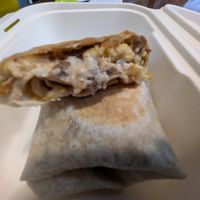 Breakfast wrap w/plant based egg, cheese, and sausage at Maydan Cafe in Baldwinsville