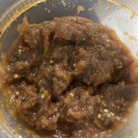 Eggplant dish in takeout container at Taj Mahal in Schenectady