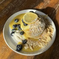Lemon curd and blueberry vegan pancakes with shortbread crumble   at The Press House   in Exeter