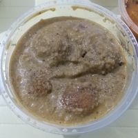 Kofta curry. Ta feio na foto pq foi no delivery, mas tava gostoso kk. rende bem pq o tempero é forte at Madrasi Culinária Indiana in São Paulo
