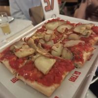 Red pizza w potatoes  at poor Tom’s  in Marrickville