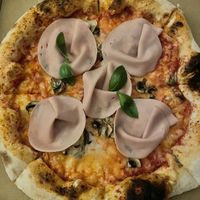   at Fari's Pizza in Ljubljana