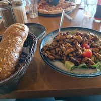 Salad with mushrum and tofu in Teriyaki sauce and bread at Cafe Optimi in Eilat