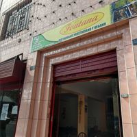 Exterior sign above entryway at Fontana Restaurante Vegetariano in Lima